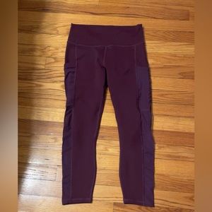 Plum color fabletics leggings with mesh cut out on sides